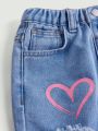 SHEIN Young Girls' Stone Washed Blue Y2k Cool Straight Leg Jeans With Pink Heart Cutouts