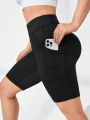 SHEIN Yoga Basic Plus Size Sports Training Shorts With Double Pockets