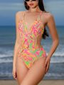 SHEIN Swim Mod Women'S One-Piece Swimsuit With Hollow Out Waist And Fluid Print Design