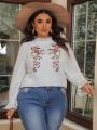 SHEIN VCAY Plus Size Floral Pattern Bell Sleeve Eyelet Embroidered Top