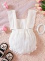 SHEIN Baby Eyelet Embroidery Ruffle Trim Bow Front Bodysuit