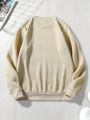 Manfinity Homme Loose Men's Regular Fit Round Neck Sweatshirt