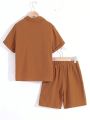 SHEIN Kids SUNSHNE Boys' Casual Solid Color Shorts & Woven Short-Sleeved Top Two-Piece Set, With Stick Decoration