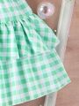 SHEIN Kids KDOMO Tween Girls' Checked Elastic Waist A-Line Skirt
