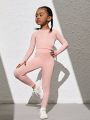 SHEIN Young Girls' Pure Color Hollow Out Back T-Shirt And Pants Sportswear Set