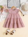 SHEIN Baby Girl Casual Solid Color Short Sleeve Doll Dress With Ruffled Hem