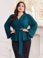 SHEIN Modely Plus Size Women'S Belted Shirt With Flared Sleeves