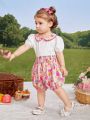 SHEIN Baby Girls' Summer Holiday Color Block Doll Collar Top With Flower Print Shorts Set