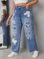 Plus Size Ripped Floral Printed Jeans With Patchwork Detail