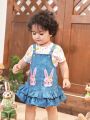 SHEIN Baby Girl's Cute Denim Style Ruffle Hem Overall Skirt With Cartoon Pattern Short Sleeve Top Outfit