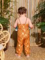 Baby Girl'S Simple Summer Jumpsuit With Foiled Floral Print Halter Neck Design