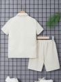 SHEIN Kids EVRYDAY Tween Boys' Loose Fit Casual Woven Short Sleeve Shirt And Shorts Set With Turn-Down Collar