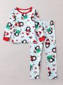 Young Boy Family Matching Penguin & Letter Graphic PJ Set