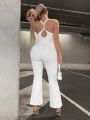 SHEIN SXY Cut Out Crisscross Back Flare Leg Jumpsuit