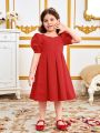 SHEIN Kids Nujoom Young Girl'S Casual Square Neck Bubble Sleeve Back Bowknot Dress