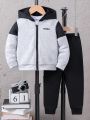 SHEIN Young Boy Two-Piece Set Consisting Of A Spliced Hooded Jacket With Letter Printing And A Casual Suit Suitable For The Autumn Season