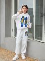 SHEIN Kids EVRYDAY Tween Girls' Knitted Loose Printed Hoodie With Characters And Matching Baggy Knit Jogger Pants Set