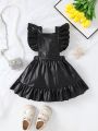 Baby Girl's Black Cool Design Crossed Pinafore Dress With Ruffled Hemline