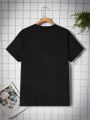 Manfinity EMRG Loose Men's Skull Hand & Playing Cards Print Round Neck T-Shirt