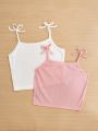 SHEIN Kids KDOMO 2pcs/set Tween Girls' Fitted Casual Ribbon Bow Strap Tank Tops