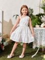 SHEIN Kids SUNSHNE Young Girl's New Hollow Out Embroidery Oblique Shoulder Bow Knot Cami Top With Elastic Waist Loose Skirt Two Piece Set