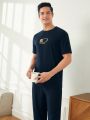 Men's Printed Short Sleeve T-Shirt With Round Neck And Solid Color Long Pants Homewear Set