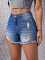 Ripped Raw Hem Denim Shorts