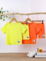 SHEIN Kids QTFun Young Girl Patch Detail Round Neck Short Sleeve Top & Shorts Casual Outfit Set, Summer