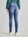 SHEIN LUNE High Stretchy And Tightening Belly Hole Ripped Worked Old Ladies' Denim Skinny Leggings