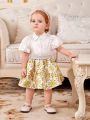 SHEIN Baby Girl Elegant Satin Bubble Short Sleeve Shirt With Floral Print Skirt Set