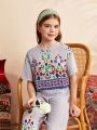 SHEIN Kids Nujoom 2pcs Tween Girl's Cute Round Neck Vacation Striped Floral Printed Shirt And Pants Set