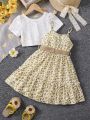 SHEIN Kids CHARMNG Young Girl's Solid Color Hollow Knit Top And Small Floral Cami Dress Set