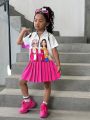 SHEIN Kids Nujoom Young Girls' Portrait Printed Short Sleeve Shirt And Pleated Skirt 2pcs Set