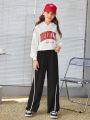 SHEIN Kids EVRYDAY Teenage Girls' Loose Fit Color Block Jogger Pants With Stripe Trim