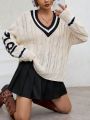 SHEIN Qutie Letter Pattern Striped Trim Drop Shoulder Cable Knit Sweater