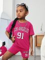 SHEIN Kids Cooltwn Young Girl Letter Graphic Drop Shoulder Tee & Shorts