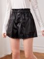 SHEIN Teenage Girls' Woven Solid Color Pu Shorts With Layered Hem And Decorative Pockets