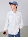 SHEIN Teen Boy Flap Pocket Drop Shoulder Shirt