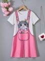 SHEIN Kids EVRYDAY Cat And Pinafore Pattern Print Short Sleeve Dress