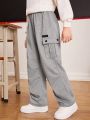 SHEIN Kids EVRYDAY Tween Boy Letter Patched Detail Flap Pocket Side Sweatpants