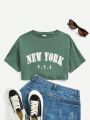 SHEIN Kids EVRYDAY Girls' Letter Printed Round Neck Cropped Casual Short Sleeve T-Shirt