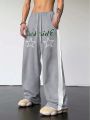 Manfinity Men's Star & Letter Printed Drawstring Waist Sweatpants