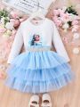 SHEIN Kids CHARMNG Young Girl Cute And Romantic Mesh Skirt And Round Neck Long Sleeve Tee 2-Piece Suit For Spring/Autumn
