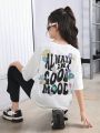 SHEIN Kids EVRYDAY Tween Girls' Flower & Letter Printed Short Sleeve T-Shirt With Solid Color Flared Pants Casual Outfits