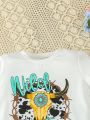 SHEIN Kids QTFun Young Girl 2pcs Letter & Cow Head Printed Short Sleeve T-Shirt With Tassel & Bell Bottom Pants