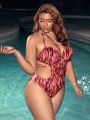 SHEIN Leisure Plus Size Hollow Out Printed One-Piece Swimsuit