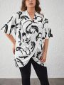 SHEIN Plus Graphic Print Cross Wrap Front Tee