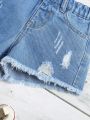 Young Girl Ripped Raw Hem Denim Shorts