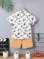 SHEIN Kids QTFun Toddler Boys' Dinosaur Short Sleeve Shirt And Shorts Set