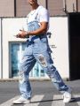 Men's Faded And Distressed Denim Overalls